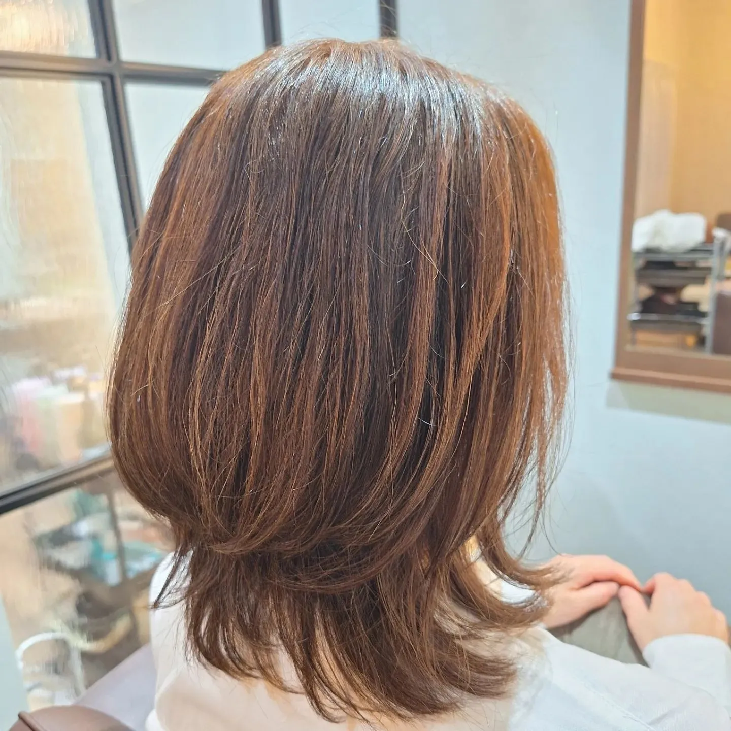 ブロー仕上げのくびれヘアー